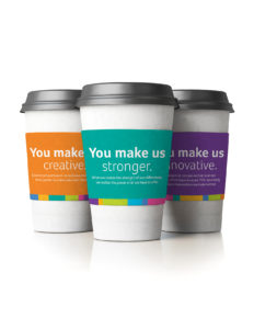 Aetna "You Make Us" coffee sleeves