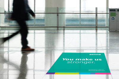 Aetna "You Make Us" floor tile